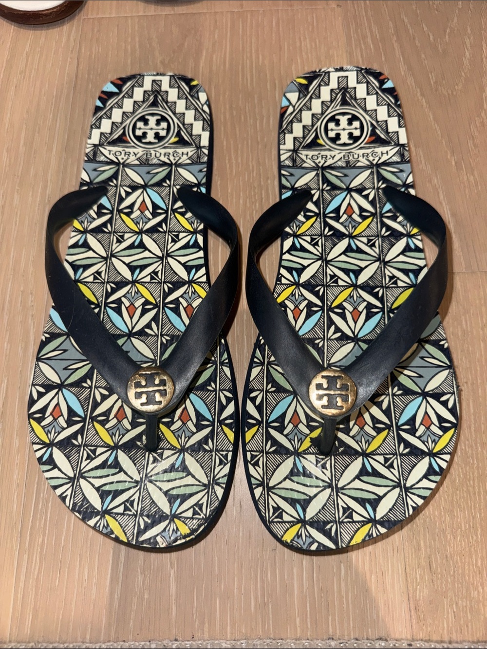 Tory Burch NAVY Logo Flip Flops with Multicolor Geometric Footbed